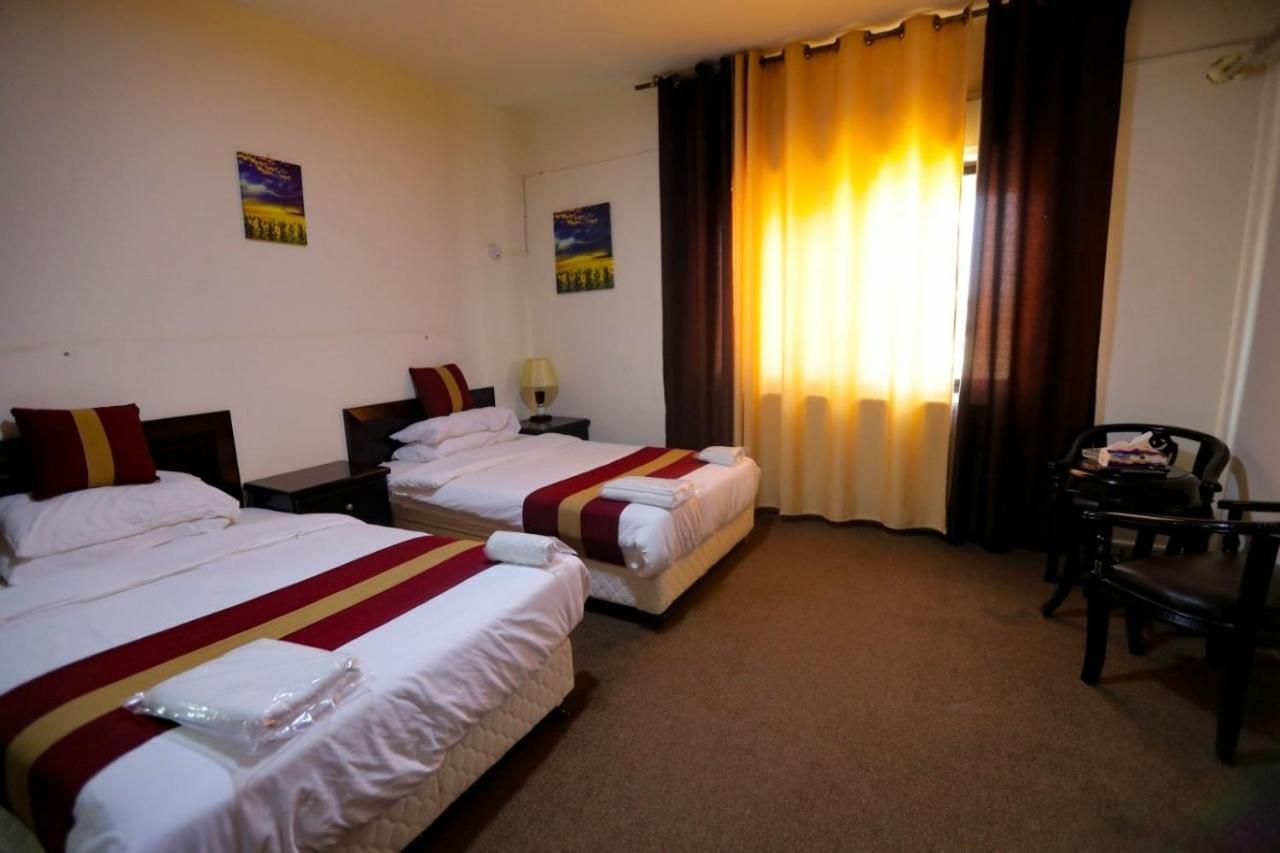 Al Bateel Hotel Apartments Amman Extérieur photo