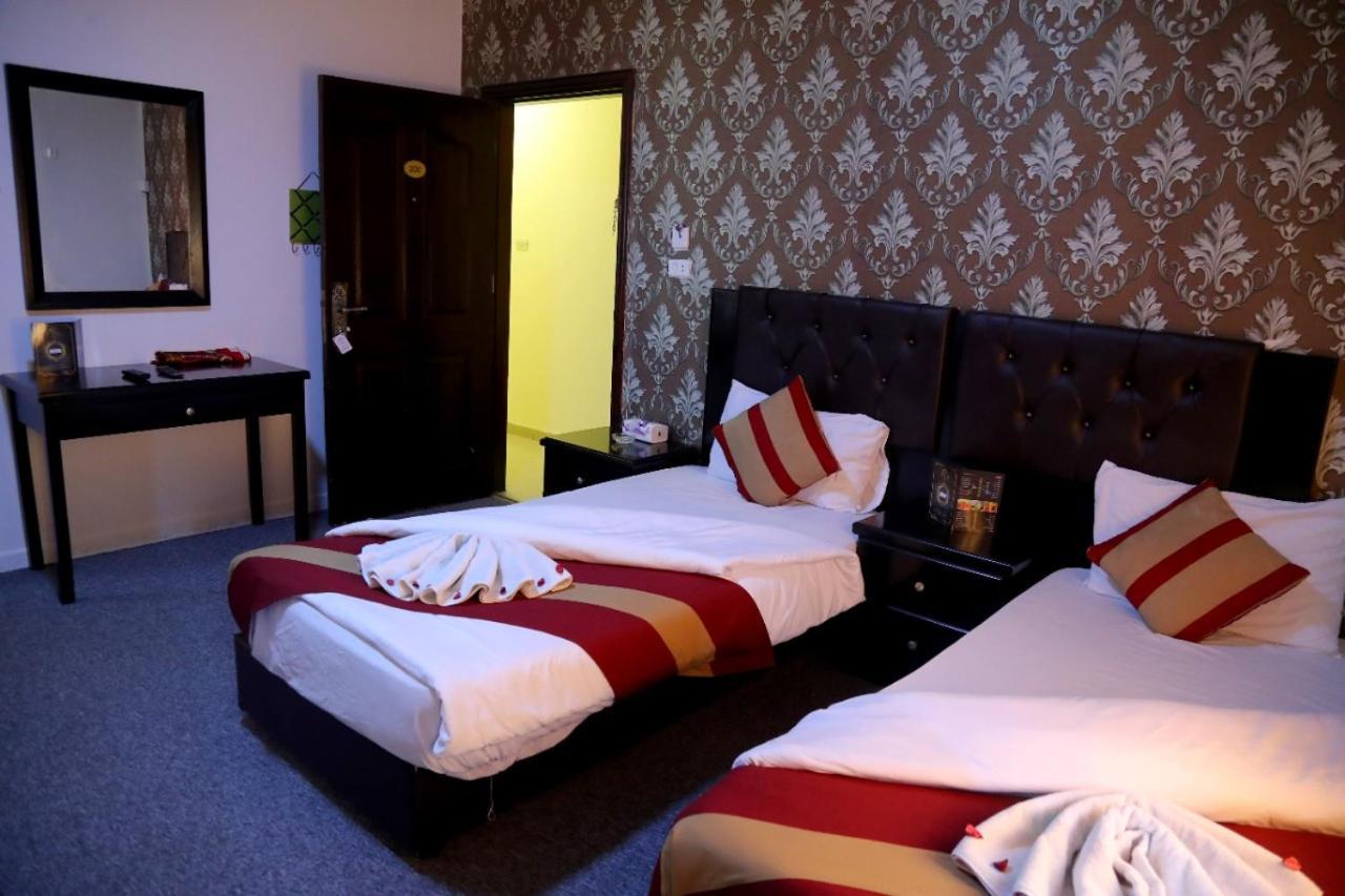 Al Bateel Hotel Apartments Amman Extérieur photo