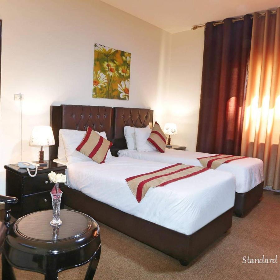 Al Bateel Hotel Apartments Amman Extérieur photo