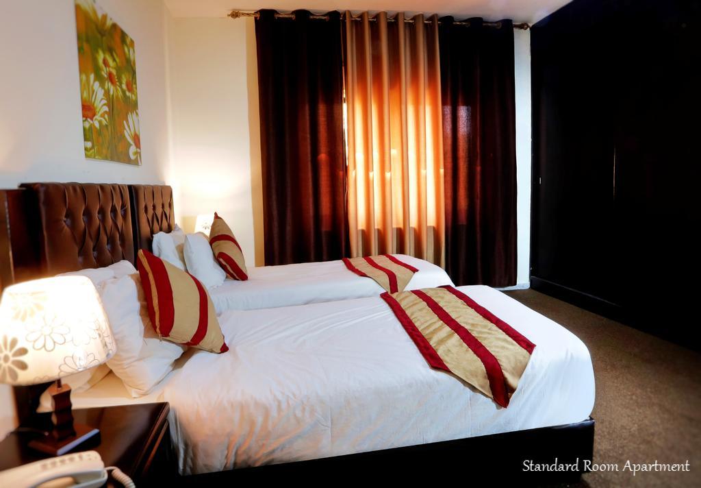 Al Bateel Hotel Apartments Amman Extérieur photo