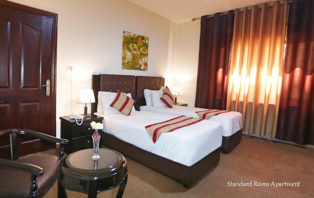 Al Bateel Hotel Apartments Amman Extérieur photo
